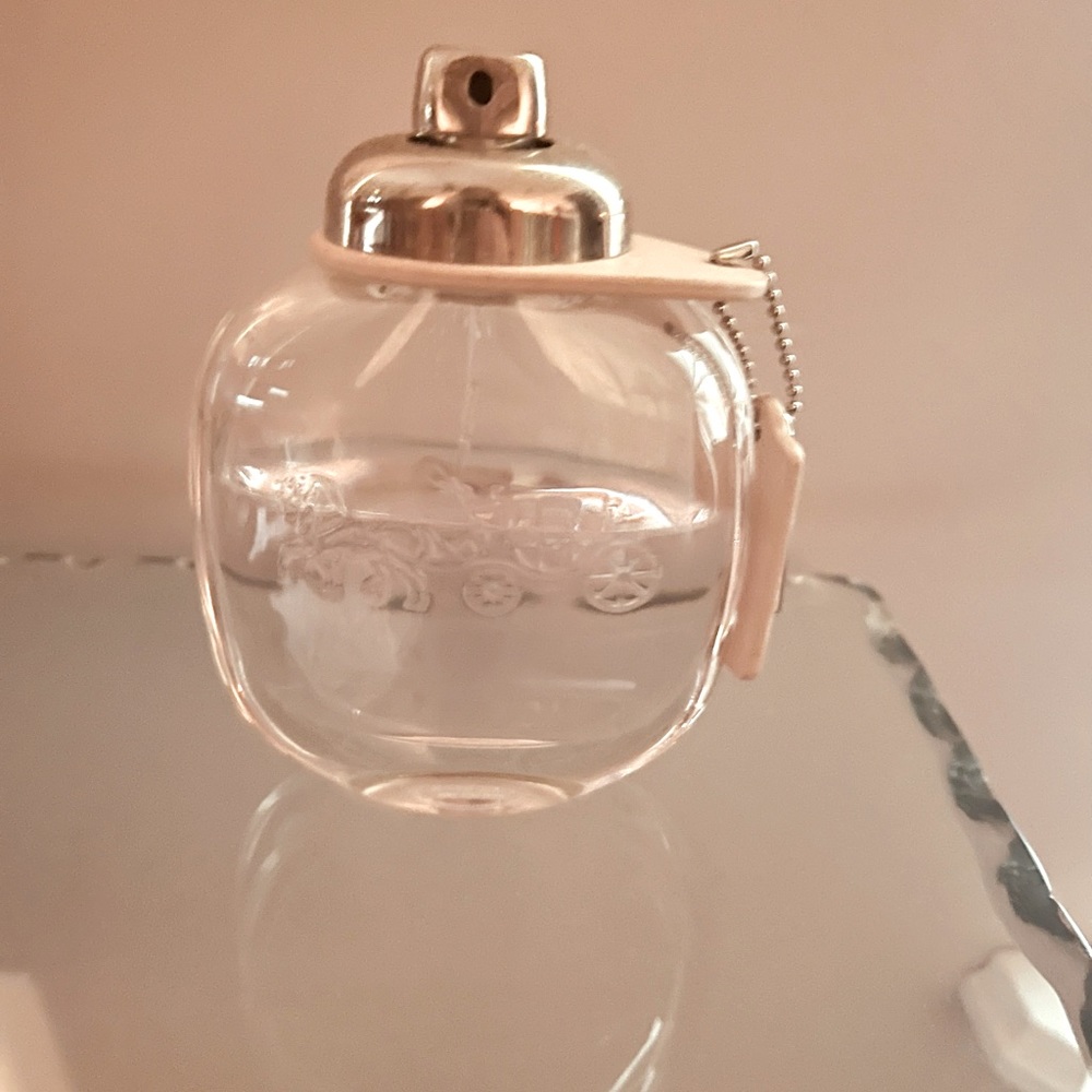 Coach Floral Eau De Parfumerie 3.0 oz Bottle is a little over half full
